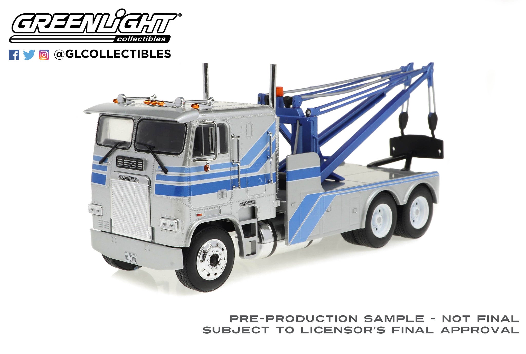 GreenLight 1 43 1984 Freightliner FLA 9664 Tow Truck Silver with Blue Stripes 86632