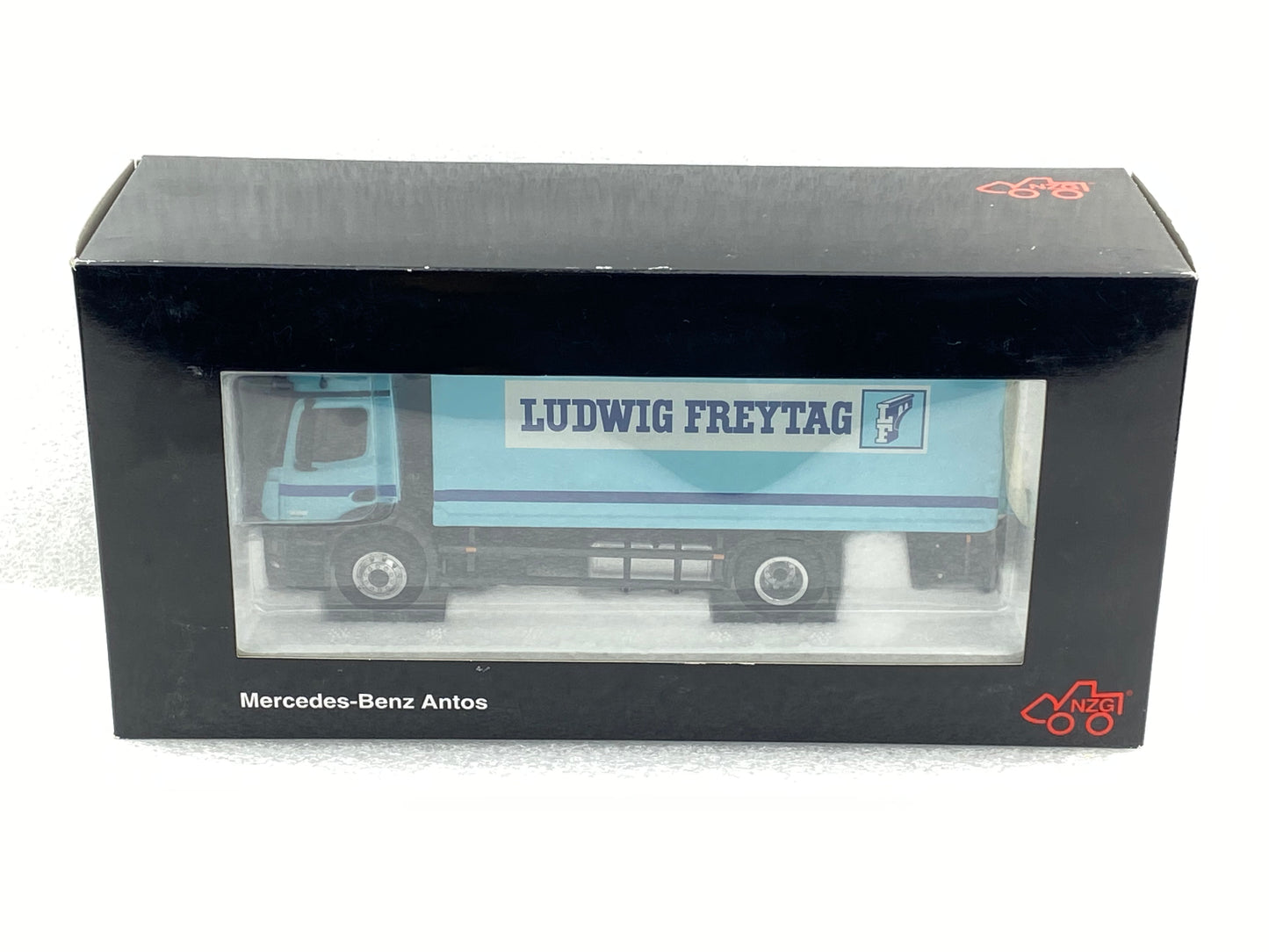 NZG 1:50 Mercedes-Benz Antos 4X2 Ludwig Freytag container truck with lifting platform NZG880/04